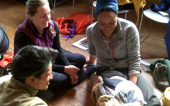 a group of gap year students practice skills during a wilderness first responder course